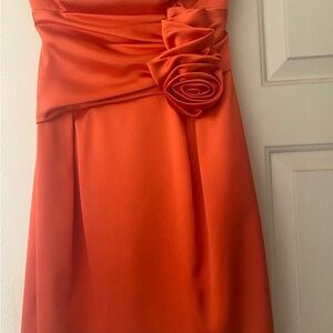Elegant Orange Dress with Floral Detail